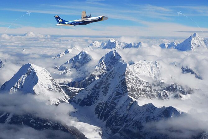 Mount Everest at sunrise above a sea of clouds